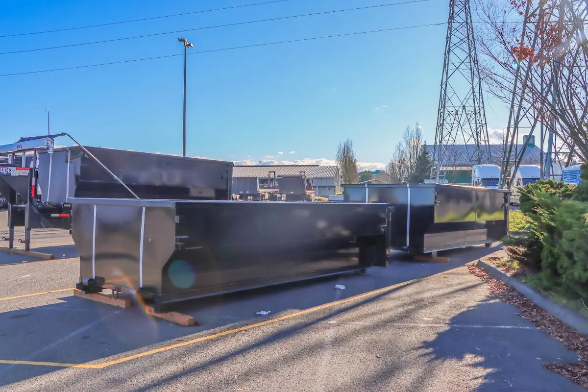 Roll-off dumpster ready for waste disposal at job site for 2 Yard Dumpster Rental in Indian Harbour Beach